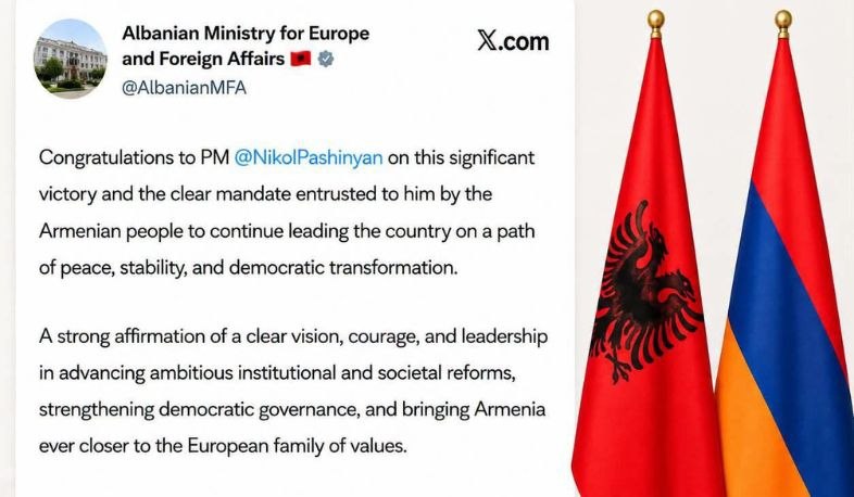 Флаг Албании и здание МИД в Тиране