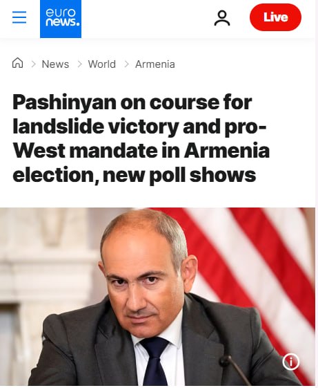 Никол Пашинян, премьер-министр Армении, на фоне флага, обсуждает выборы в Тавушской области.
